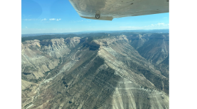Approaching the Roan Plateau, developed roads climb the cliffs.