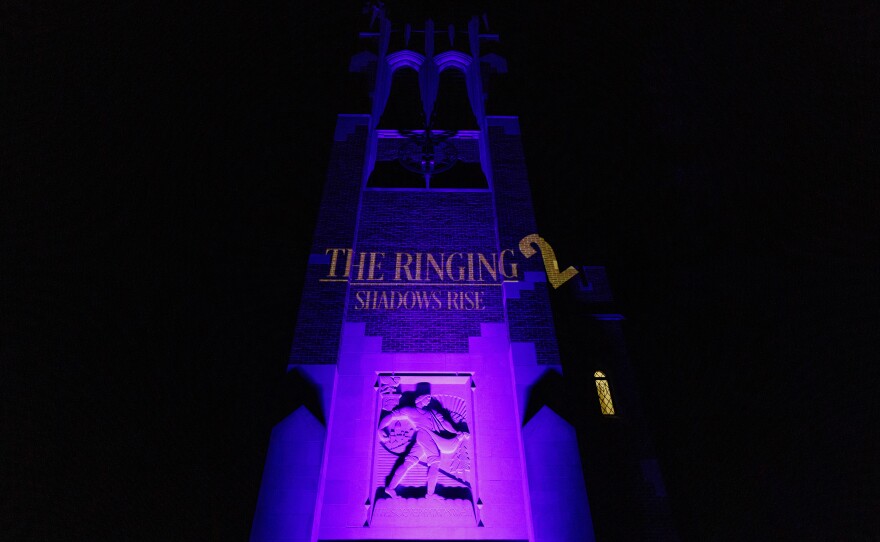 Animations designed by Michigan State University Department of Theatre students are projected onto the face of Beaumont Tower in East Lansing, Mich., on Oct. 30, 2025, during a Halloween concert on the university carillon.