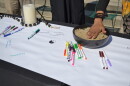 Table with markers and candles 