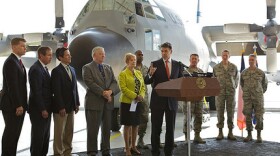 Governor Rick Perry is shown at Fort Worth's C-130 hangars in April.