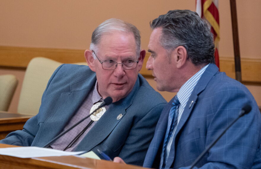 Kansas House Speaker Dan Hawkins, left, says he welcomes the Kansas Department of Revenue report showing the state government collected $147 million in taxes than anticipated during the initial three-month period of the 2027 fiscal year. The photograph of Hawkins, a candidate for state insurance commissioner, a Jan. 8, 2026, meeting at the Capitol.