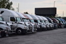 Semitrucks line up at a Kansas City truck stop in a region where nearly 1 in 10 workers hold transportation and material moving jobs.