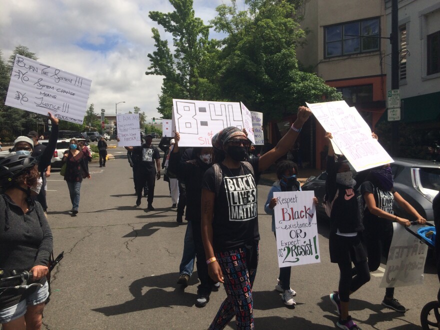 Demonstrators near the Plaza in downtown Ashland on Sunday, May 31, 2020