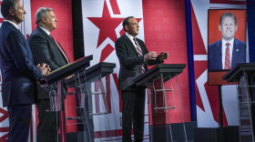 Former Westchester County Executive Rob Astorino, far left, businessman Harry Wilson, second from left, Suffolk County Congressman Lee Zeldin, second from right, and Andrew Giuliani, far right, son of former New York City Mayor Rudy Giuliani, face off during New York's Republican gubernatorial debate at the studios of CBS2 TV, Monday, June 13, 2022, in New York. Giuliani participated via virtual broadcast after he was blocked from the studios for not meeting vaccine requirements. (AP Photo/Bebeto Matthews)