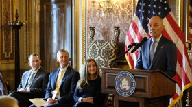 Utah Supreme Court nominees Judge Matthew Bell (far left) and Michael Menssen (left) sit alongside 3rd District Court Nominee Elizabeth Butler as Gov. Spencer Cox announced their nominations during a press conference at the Utah State Capitol, Aug. 28, 2026.