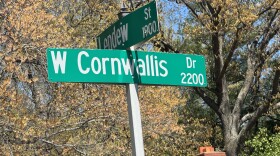 A photo of a street sign that says West Cornwallis Drive.