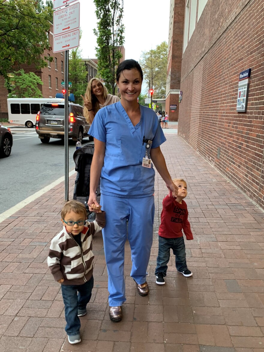 Dr. Lauren Jenkins walks with her two sons, Pierce and Ashton, in Philadelphia in the fall of 2019.