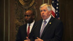 Missouri Gov. Mike Parson, right, at a press conference about some of the first public coronavirus precautions on Monday with Kansas City Mayor Quinton Lucas.