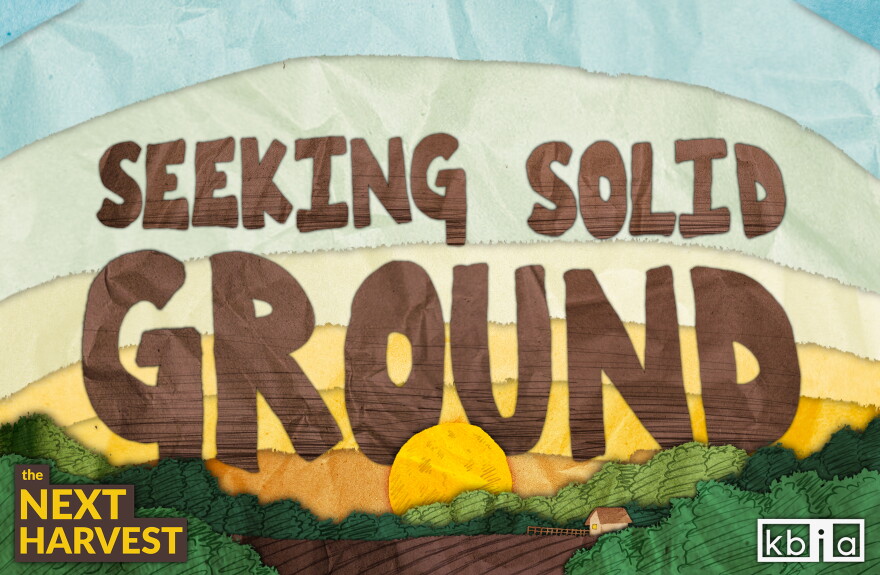 An illustration of a sun rising over the horizon of a farm. Large brown letters in the sky spell "Seeking Solid Ground." "The Next Harvest" is written in yellow text on the lefthand corner. The KBIA logo is in white in the right corner. 