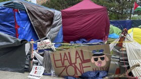 A pro-Palestinian encampment is shown Tuesday, May 28, 2024, on the campus of Wayne State University in Detroit. The school suspended in-person classes and encouraged staff to work remotely to avoid any problems with the encampment. (AP Photo/Mike Householder)