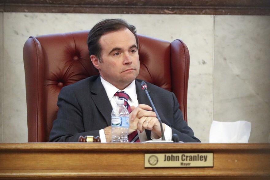 FILE - In this March 21, 2018, file photo, Cincinnati Mayor John Cranley listens during a city council meeting at city hall in Cincinnati. The Democrat announced on Friday, Feb. 14, 2020, that he is exploring a run for Ohio governor in 2022.