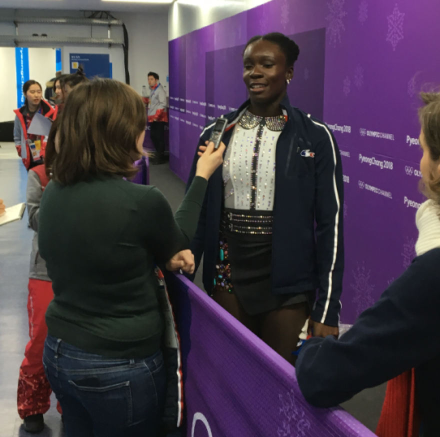French figure skater Mae Berenice Meite manages to catch the attention of one reporter in the mixed zone, where media members wait for athletes after they compete. Meite is a relative unknown — she finished 19th in the ladies individual event. The biggest stars are greeted by a throng of journalists. "I'm taking my time to make my own history," Meite said.