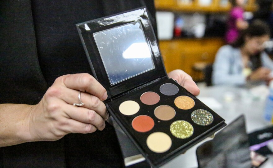 Students in the Cibola aesthetics club designed an eyeshadow palette, called "The Gold Standard," that they're now selling to cover the cost of Jackie Alves' master class instruction.