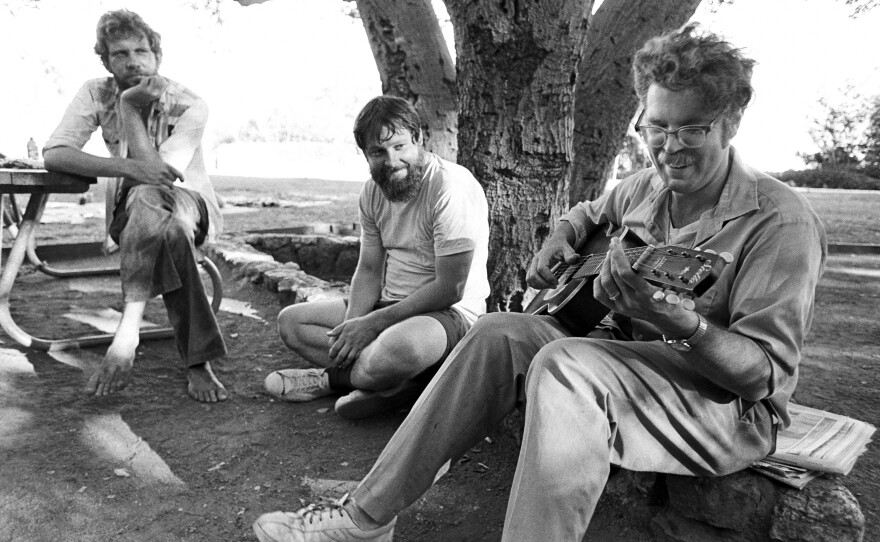 <em></em>Robbie Basho playing for fans in Cragmont Park in Berkeley, California, in 1977.