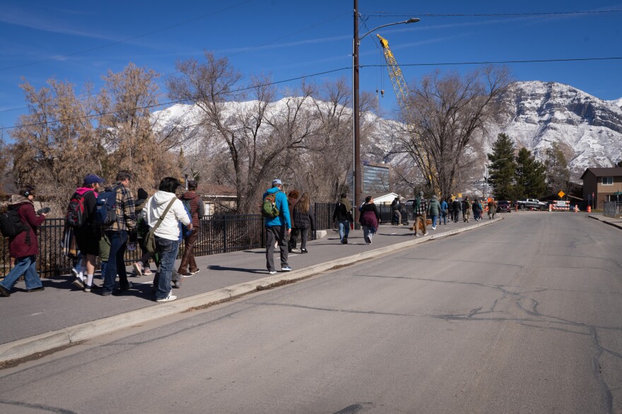 People on the third annual Provo River Massacre memorial walk head to the next site