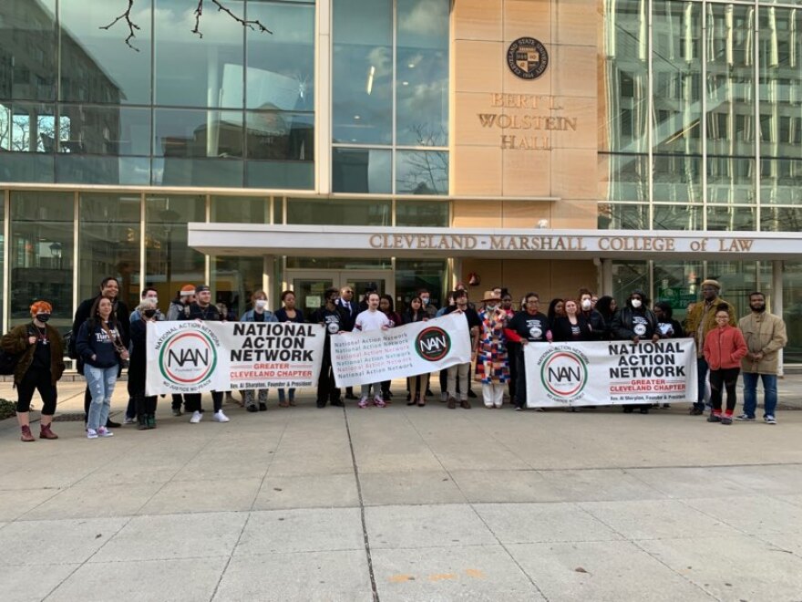 A few dozen gathered for a rally outside of Cleveland State's law school.