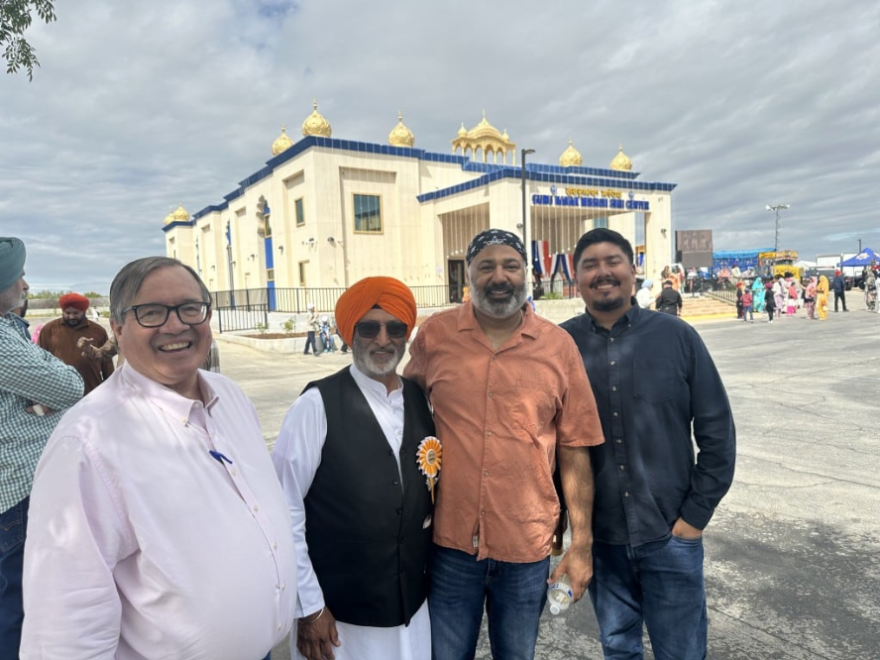 Tim Ashlock, left, manager of Buena Vista Water Storage District, joins farmer Paramjit Dosanjh, Jeevan Muhar, manager of Arvin-Edison Water Storage District and Daniel Maldonado, then assistant director of the Bakersfield Water Resources Department, at a temple dedication ceremony in March 2025.