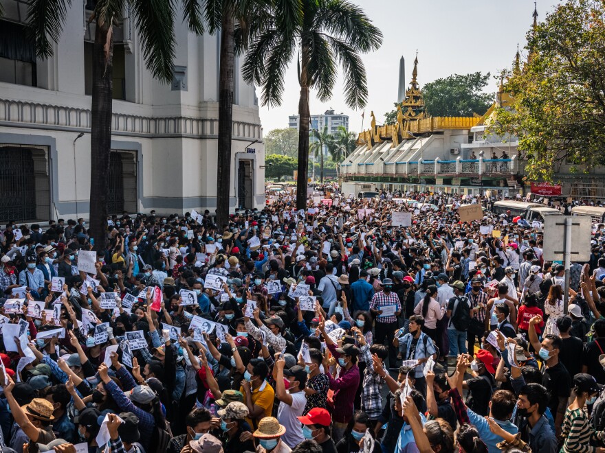 Protests continued on Monday in cities across Myanmar, including this one in Yangon, as people took to the streets to demand the release of de facto leader Aung San Suu Kyi and return to democratic rule following a military coup.