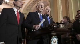 Senate Majority Leader Mitch McConnell, R-Ky., flanked by Sen. John Barrasso, R-Wyo., left, and Majority Whip John Cornyn, R-Texas, speaks to reporters about efforts to avoid a government shutdown this weekend, at the Capitol in Washington, Wednesday, Jan. 17, 2018. (J. Scott Applewhite/AP)