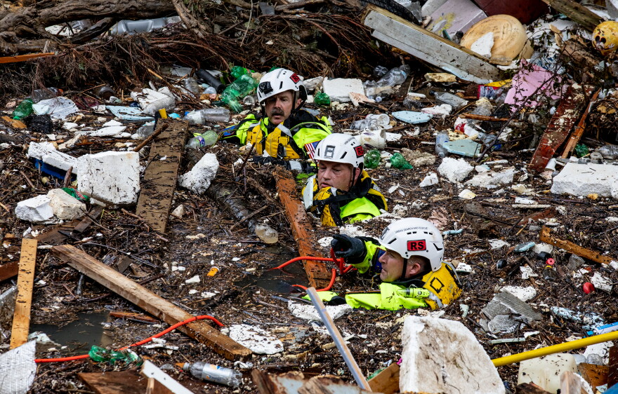 Members of the Tennessee Task Force One search and rescue team waded through Troublesome Creek in Perry County, searching for victims after one of the Gideon Rescue HR (Human Remains) Dogs 'hit' on an area jumbled with debris on Sunday, July 31, 2022