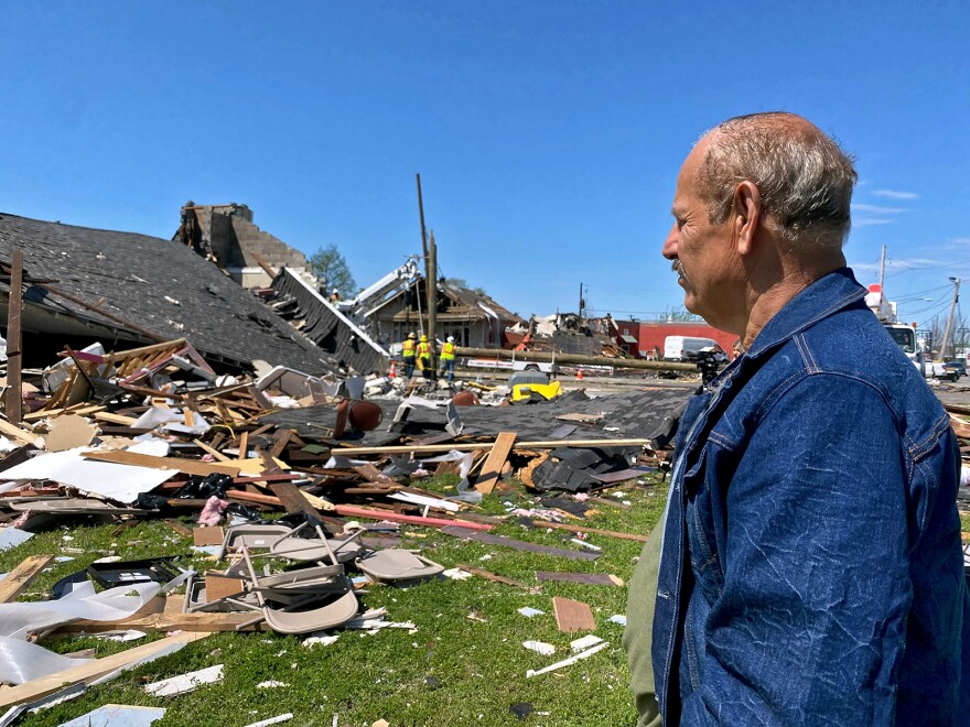 David Pagan surveys the damage left to his church, La Vid Verdadera, in Arabi, Louisiana after an EF3 tornado ripped through area.