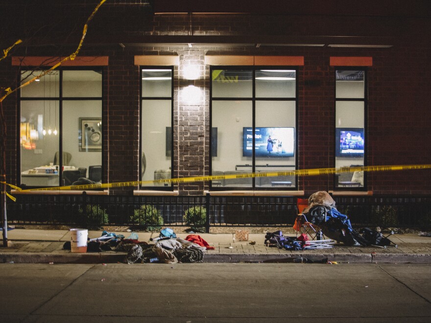 WAUKESHA, WI - NOVEMBER 21: Debris litters the street at a crime scene on November 21, 2021 in Waukesha, Wisconsin. According to reports, an SUV drove through pedestrians at a holiday parade, killing at least one and injuring 20 more. (Photo by Jim Vondruska/Getty Images)