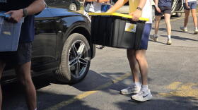 Student athletes at Canisius University help a freshman move into his new dorm.