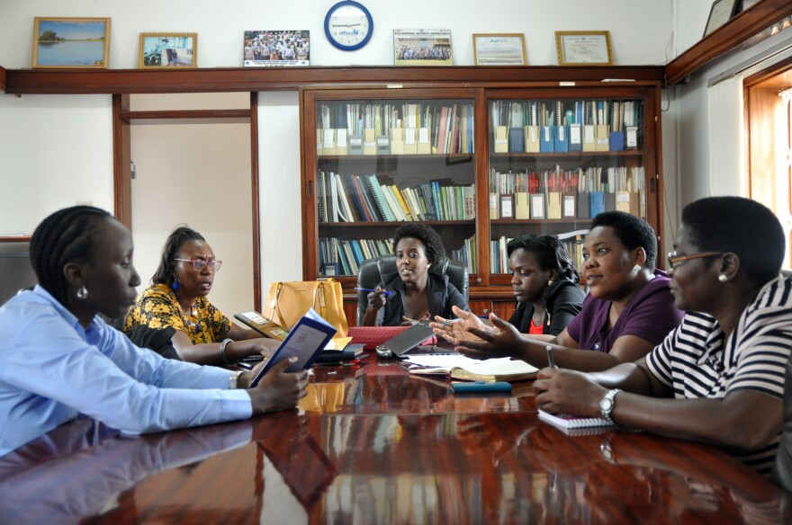 Representatives from civil service organizations in Kampala meet at ACODE to discuss a campaign for stricter regulations for GMOs in Uganda. 