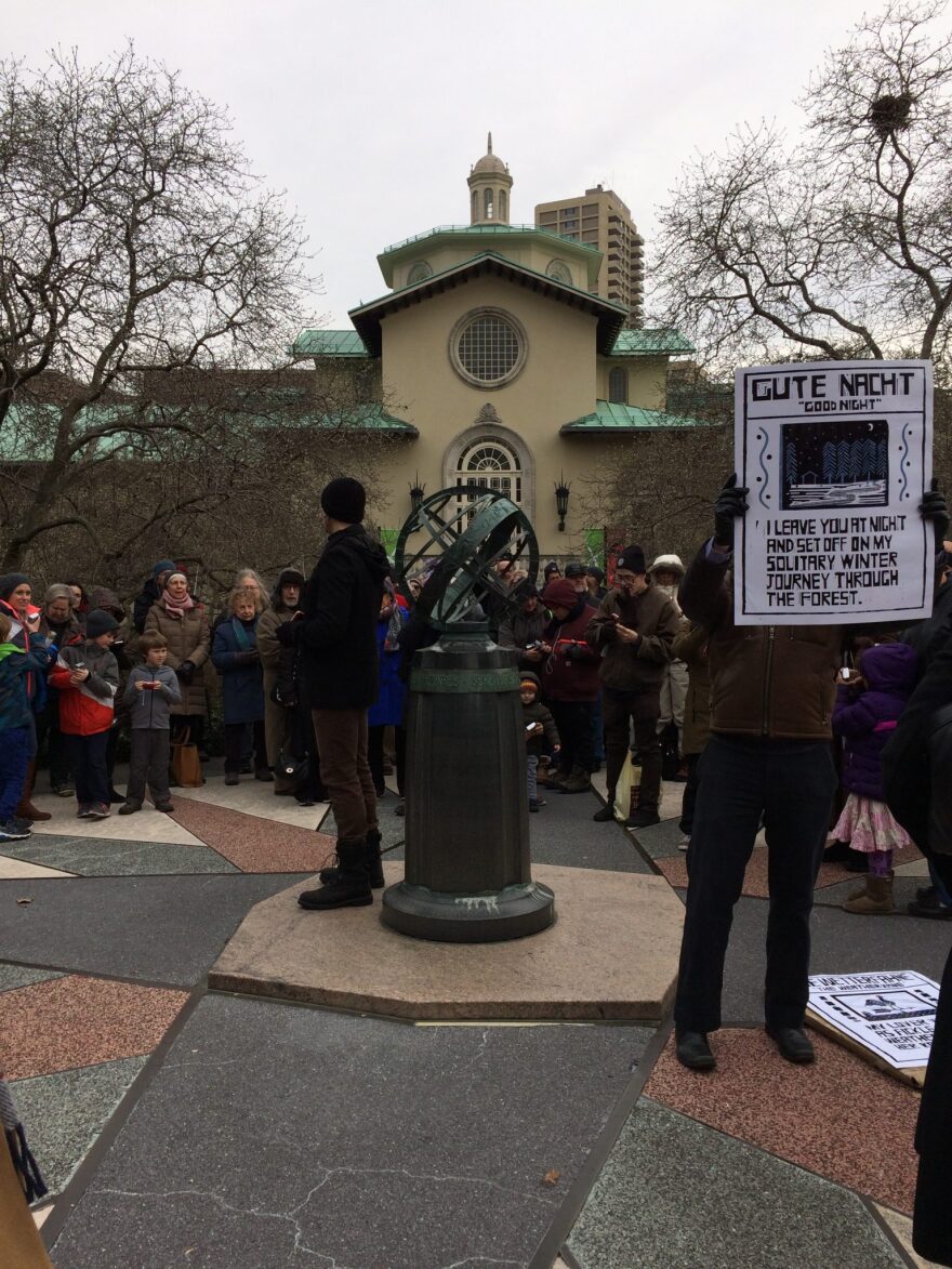 Christopher Herbert performs for a chilly crowd in the Brooklyn Botanic Garden in New York.