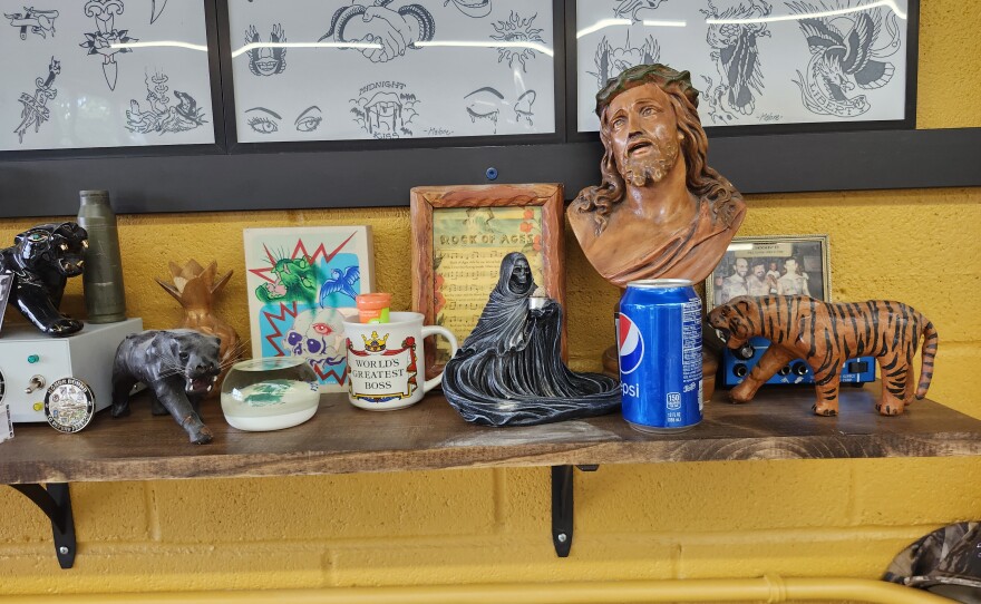 A shelf of eclectic items.