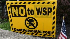 A yard sign in Logansport against the zinc oxide manufacturing plant, owned by Waelz Sustainable Products.