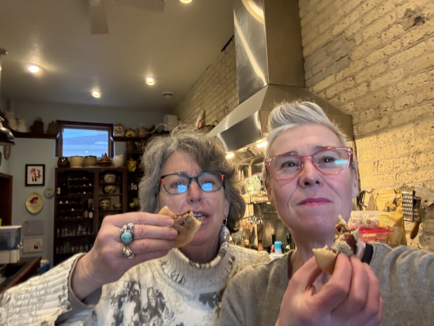Susan Bence (left) and Christina Ward taste test the cookie in Ward's kitchen.