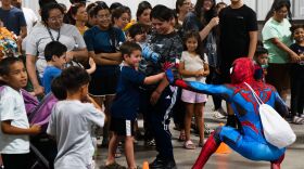 Superheroes have been known to make an appearance at past Lerner & Rowe backpack giveaways.