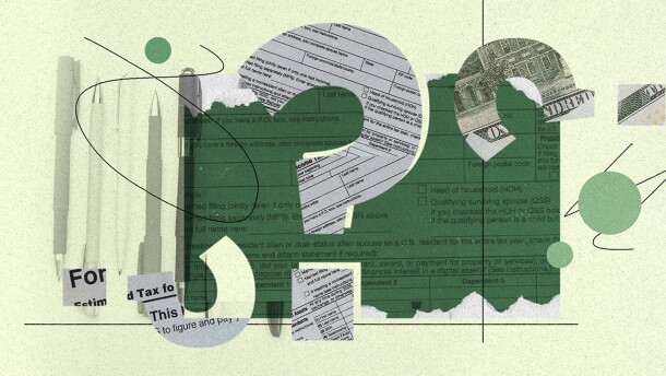 Tax documents and opaque pens on a yellow background.