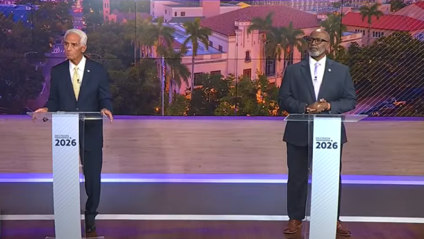 Two men standing at podiums