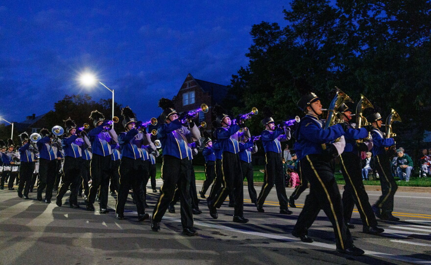 The Haslett High School marching band performs in the Michigan State University Homecoming Parade in East Lansing, Mich., on Oct. 9, 2026.