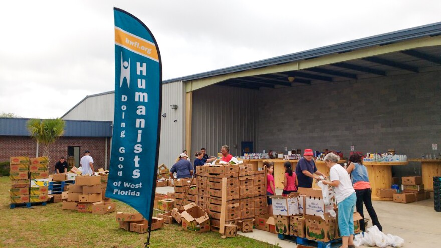 The Humanists at one of their large food shares in 2017. The group has since moved to providing smaller food bags to feed people in need over the weekend when food banks are closed.