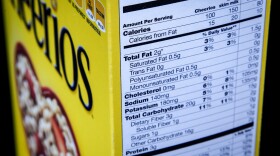 The nutrition facts label on the side of a cereal box is photographed in Washington. (J. David Ake, File/AP)