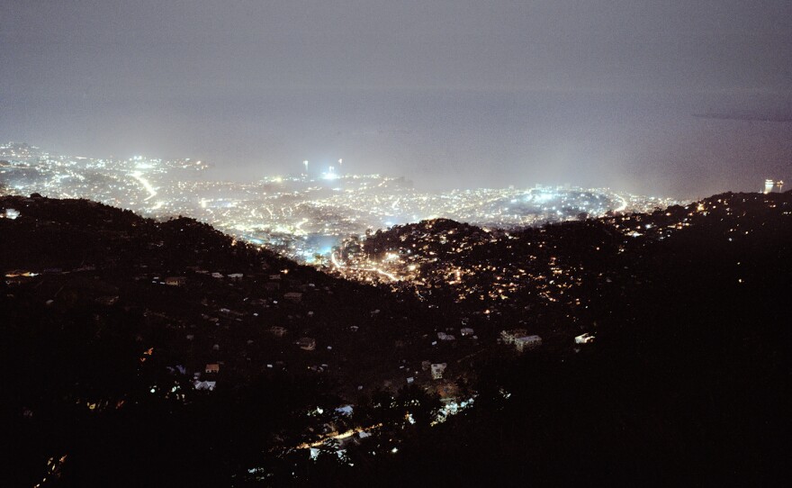 The view of Freetown from Leicester Peak. Last year's cholera outbreak struck hardest in the slums, where crowded and unsanitary living conditions and unsafe water sources allowed the disease to spread rapidly.