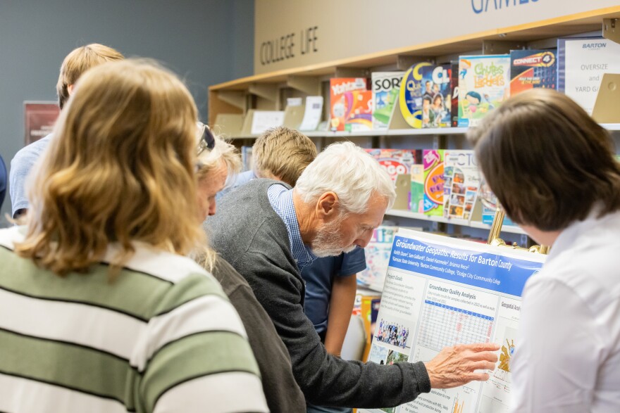 Barton Community College faculty, students and members of the public view information about nitrate levels in central Kansas groundwater during a presentation at the college.