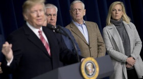 From left, President Trump, accompanied by Secretary of State Rex Tillerson, Defense Secretary Jim Mattis and Secretary of Homeland Security Kirstjen Nielsen, speaks to members of the media after participating in a Congressional Republican Leadership Retreat at Camp David, Md., Saturday, Jan. 6, 2018. (Andrew Harnik/AP)
