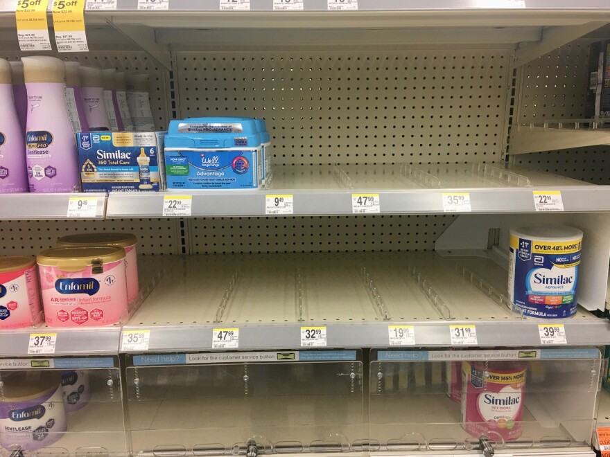 Shelves where baby formula should be at a local Walgreens are half-empty as stores around the country grapple with a supply shortage. 