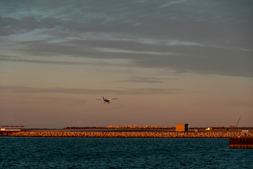 A plane lands at Burke Lakefront Airport in Cleveland