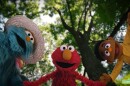 Sesame Street characters Rosita, Elmo, and Wes perform in “Great Things,” a music video about how to process the emotions that can occur after experiencing bias. 