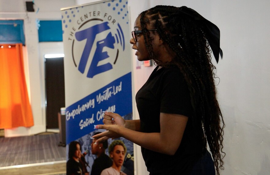 Emerra Moore recites a poem she wrote about the positive force young people at Teen Empowerment possess to create change in their community. The Center for Teen Empowerment is expanding its reach to the north side of Rochester with a new hub at Dewey and Magee avenues in the historic Maplewood neighborhood.