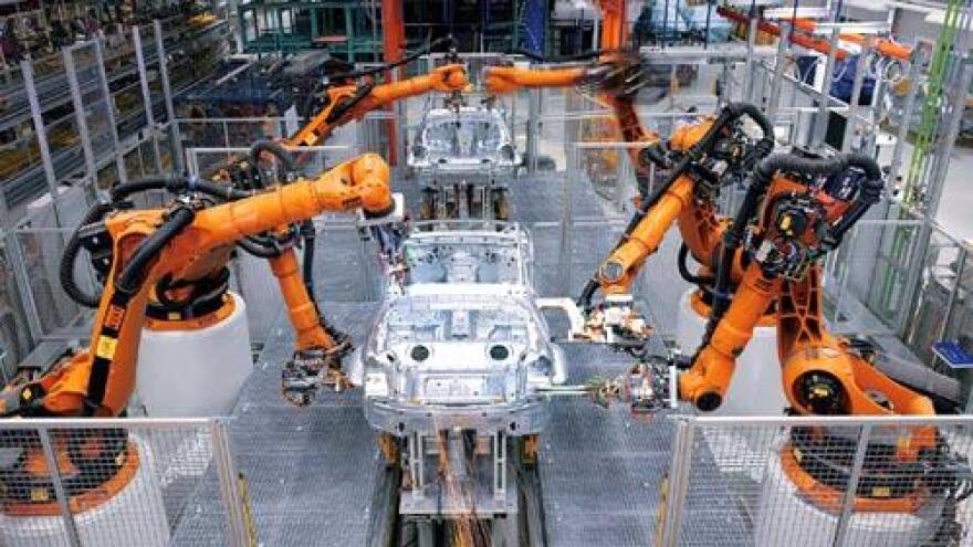 Industrial robots on an automobile assembly line.