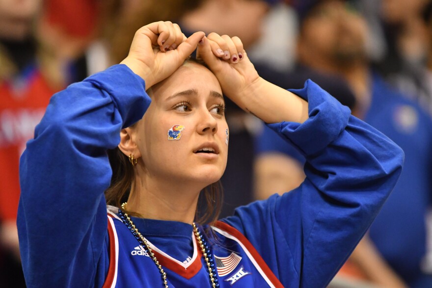 Shae Schiff-Clark nervously watches the last seconds wind inside Allen Fieldhouse.