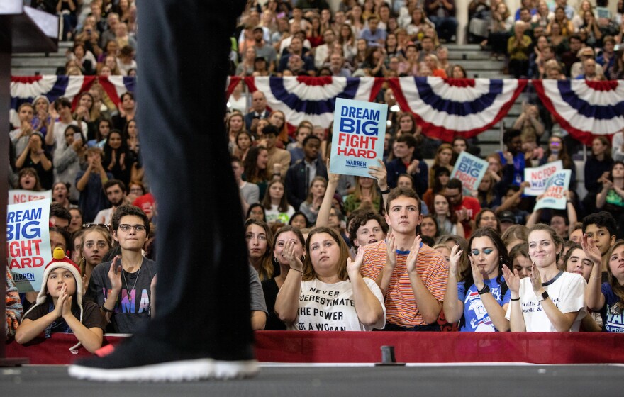 Supporters applaud as Democratic Presidential Candidate Elizabeth Warren speaks to a capacity crowd of more than 3,500 people at Broughton High School in Raleigh, N.C., Thursday, Nov. 7, 2019.