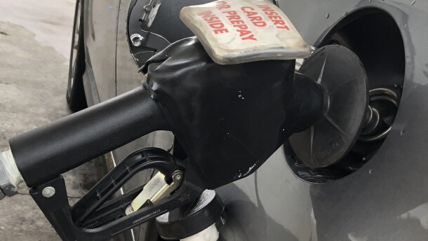 A gas pump is shown filling a vehicle's tank at a Peoria-area station. 