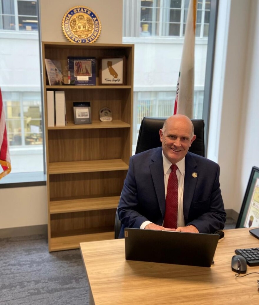 Assemblymember Kelly Seyarto sitting at his Sacramento office desk.